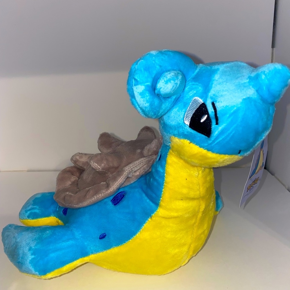 Pokémon Lapras Plush…..around 10/12 inches.